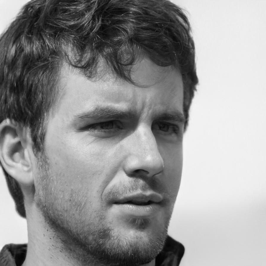Portrait of Niklaus Thornfield, Co-Founder and Budget Systems Architect