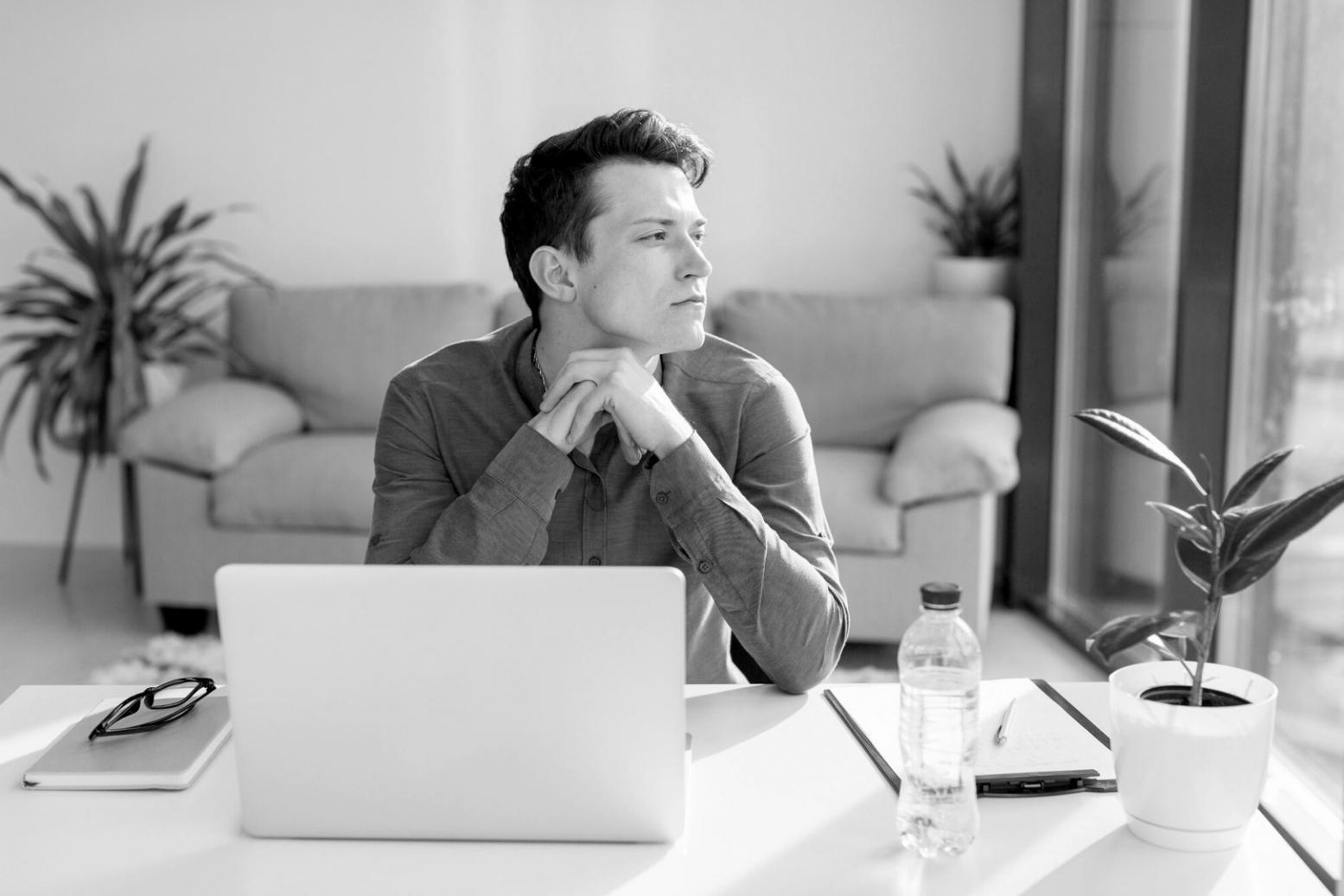 Modern collaborative workspace with financial planning materials and strategic documents
